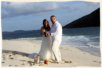 Unique helicopter wedding couple champagne toast. US Virgin Islands